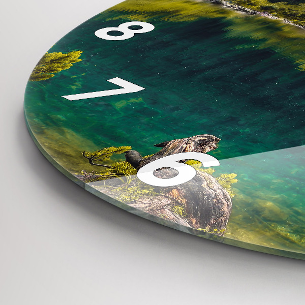 Round glass clock Morskie Oko in the Tatra Mountains