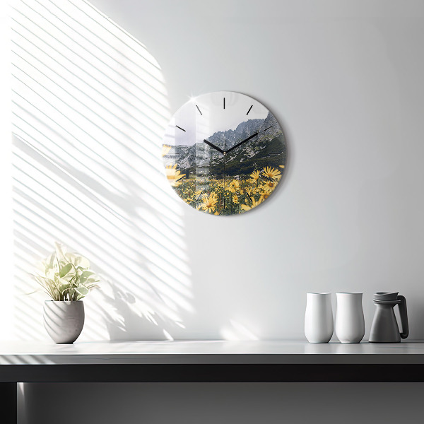 Round glass clock Meadow flowers in the mountains
