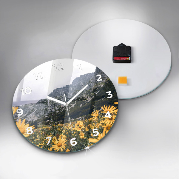 Round glass clock Meadow flowers in the mountains