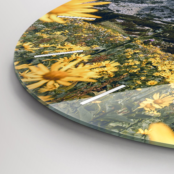 Round glass clock Meadow flowers in the mountains