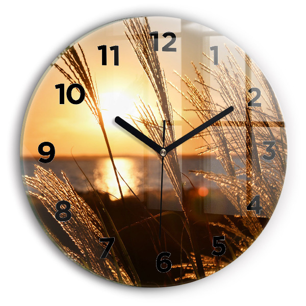 Round glass clock Wheat in the golden sun