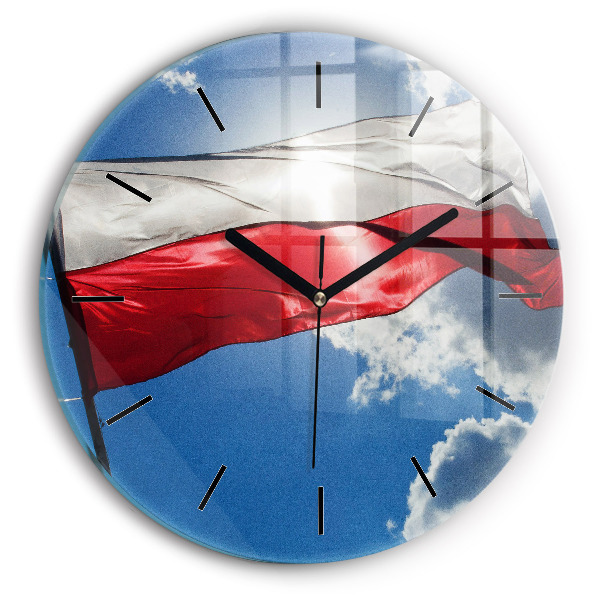 Round glass clock The Polish flag against the sky