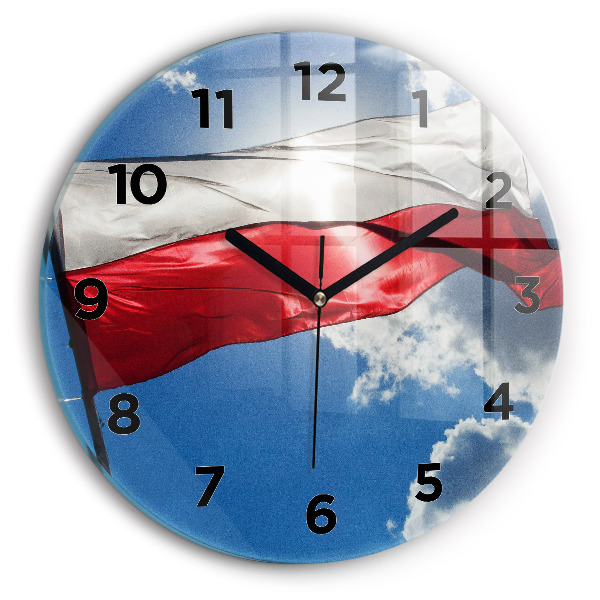 Round glass clock The Polish flag against the sky