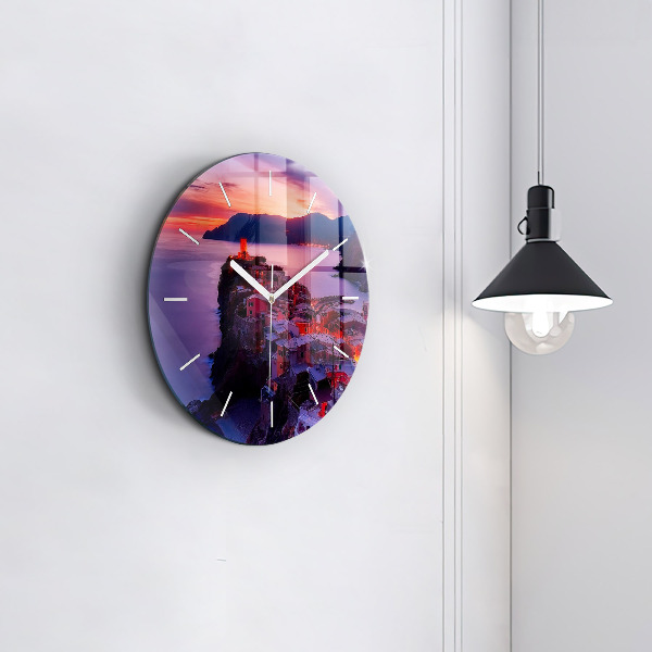 Round glass clock Houses near the Lake