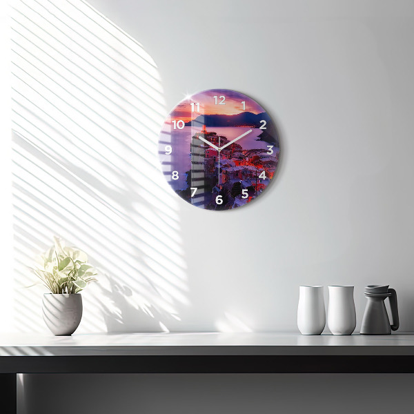 Round glass clock Houses near the Lake