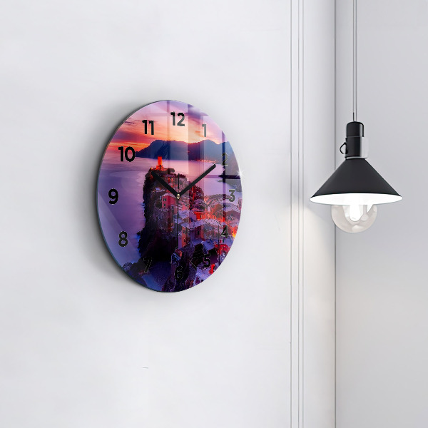 Round glass clock Houses near the Lake