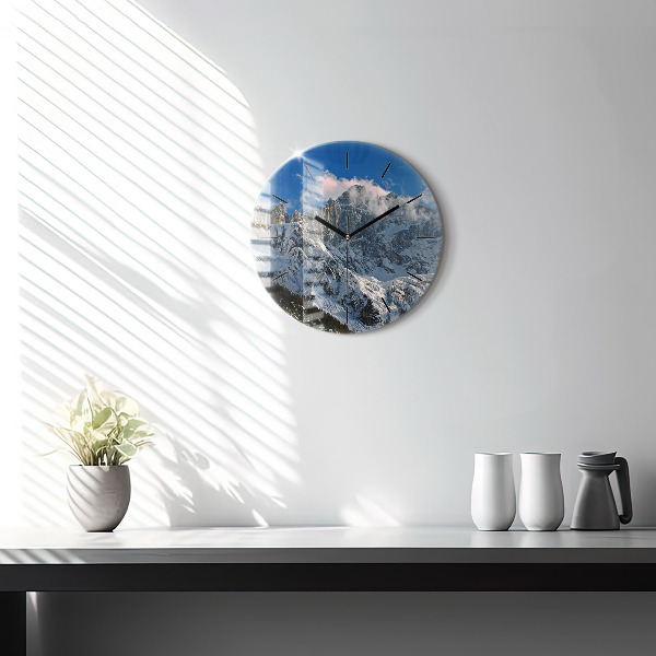 Round glass clock Mountains under blue sky