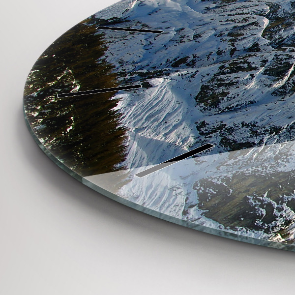 Round glass clock Mountains under blue sky