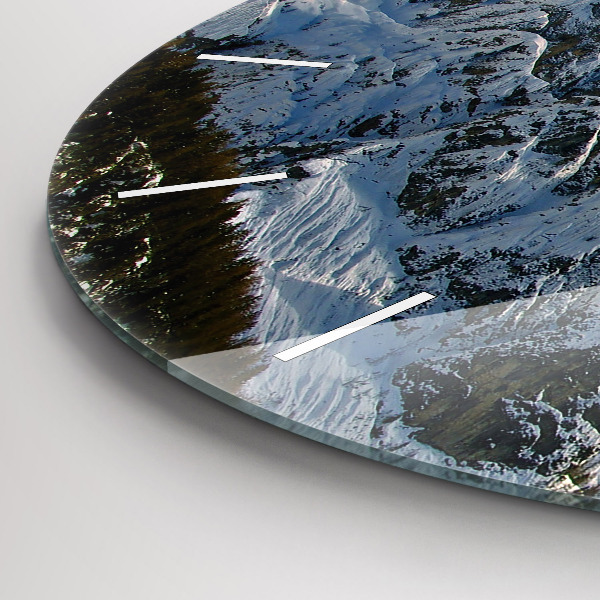 Round glass clock Mountains under blue sky