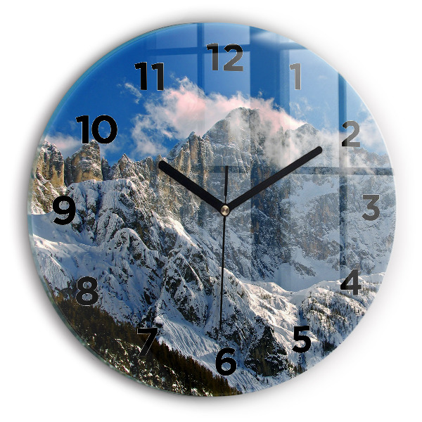 Round glass clock Mountains under blue sky