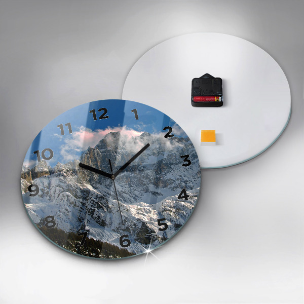 Round glass clock Mountains under blue sky