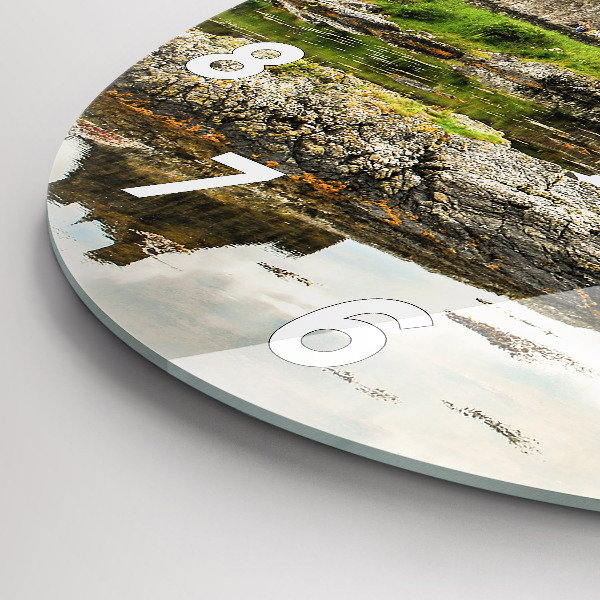 Round glass clock Eilean Donan Castle Scotland
