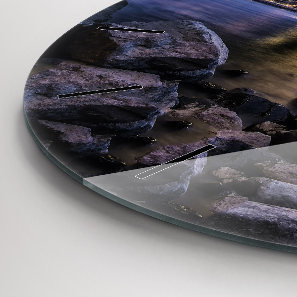 Round glass clock Rocky shore under the bridge
