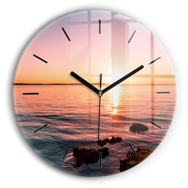 Round glass clock Rocks at sunset