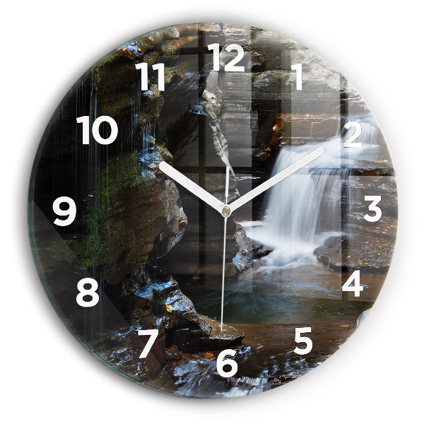 Round glass clock Waterfall and rocks of Iceland