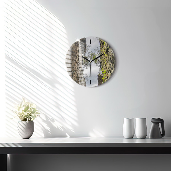 Round glass clock Rock city in the Czech Republic