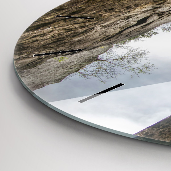 Round glass clock Rock city in the Czech Republic