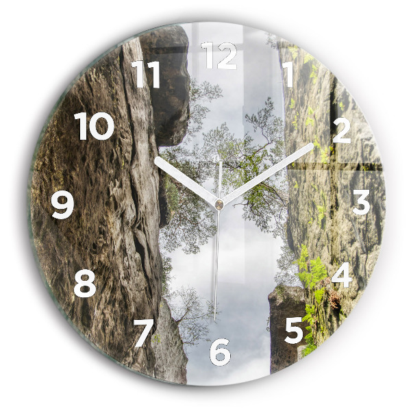 Round glass clock Rock city in the Czech Republic