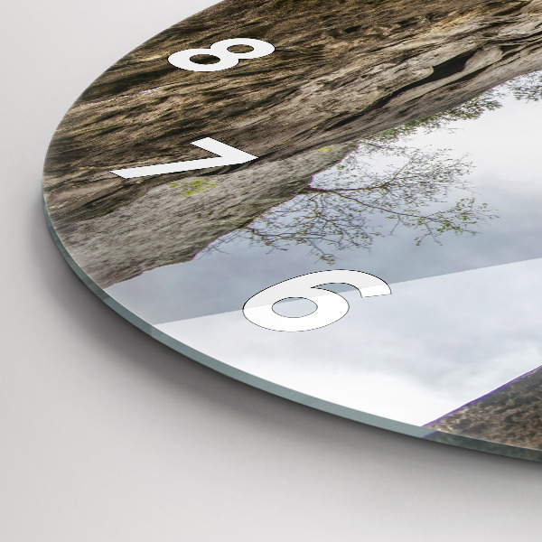 Round glass clock Rock city in the Czech Republic