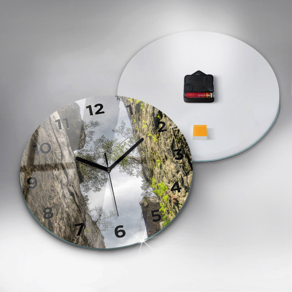 Round glass clock Rock city in the Czech Republic