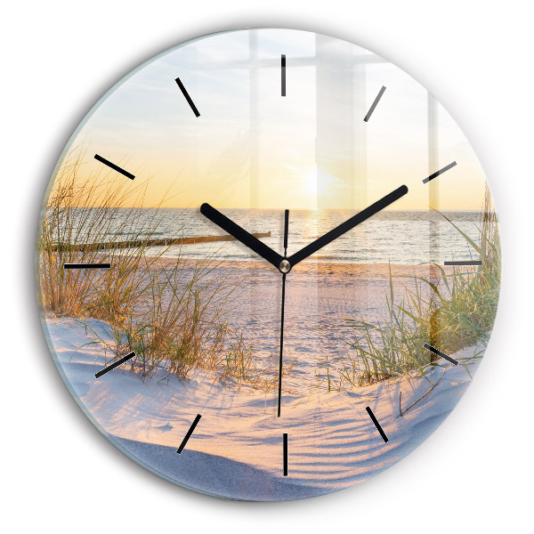 Round glass clock Sunset over the sea