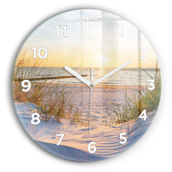 Round glass clock Sunset over the sea