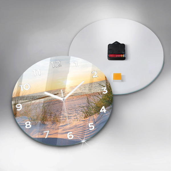 Round glass clock Sunset over the sea