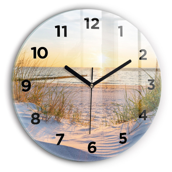 Round glass clock Sunset over the sea