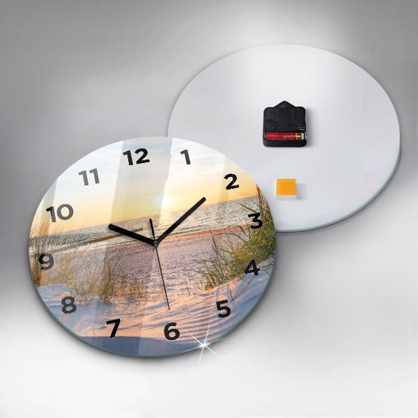 Round glass clock Sunset over the sea