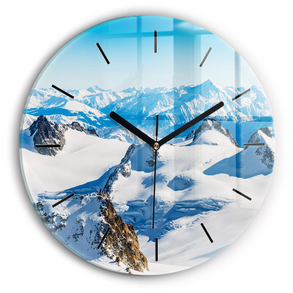 Round glass clock Skier in the Alps