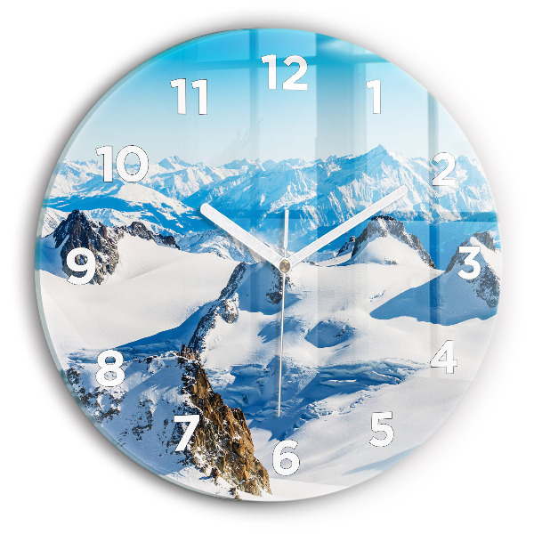 Round glass clock Skier in the Alps