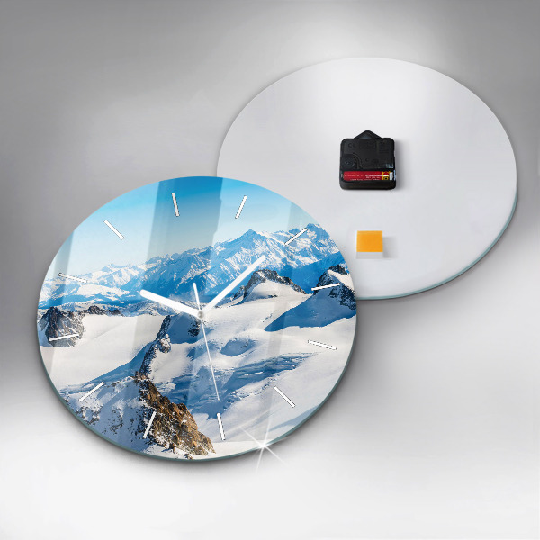 Round glass clock Skier in the Alps