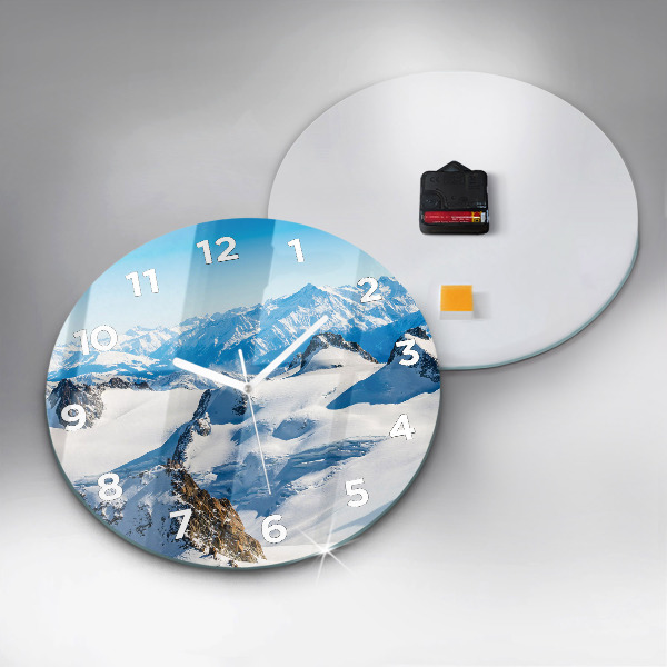 Round glass clock Skier in the Alps