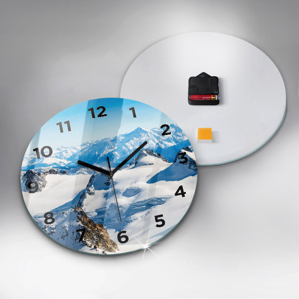 Round glass clock Skier in the Alps