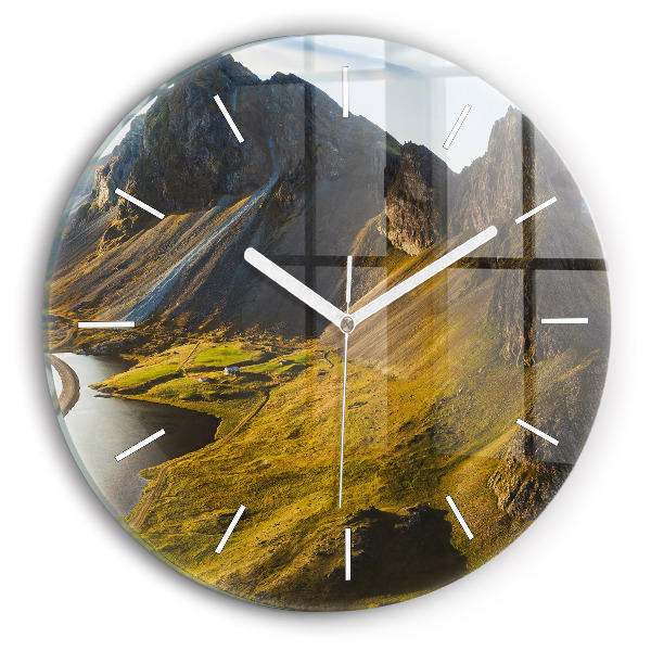 Round glass clock Road in Iceland