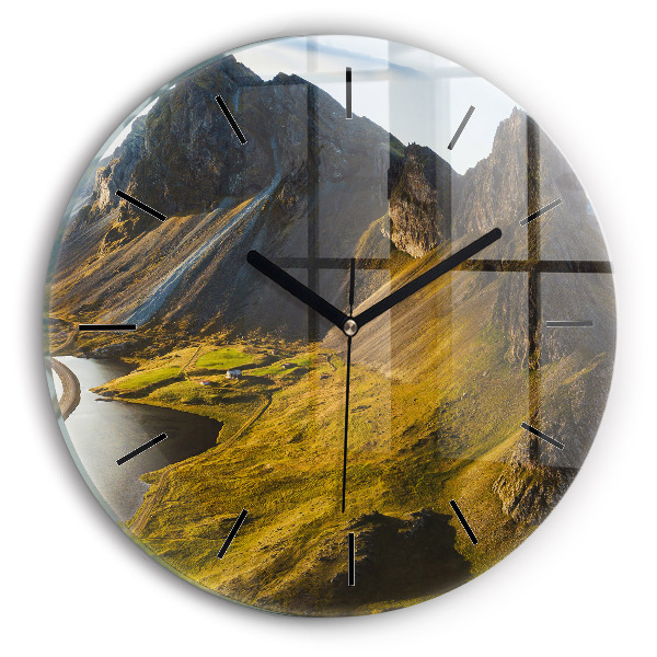 Round glass clock Road in Iceland