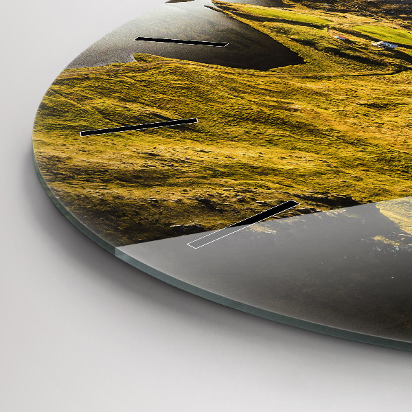 Round glass clock Road in Iceland