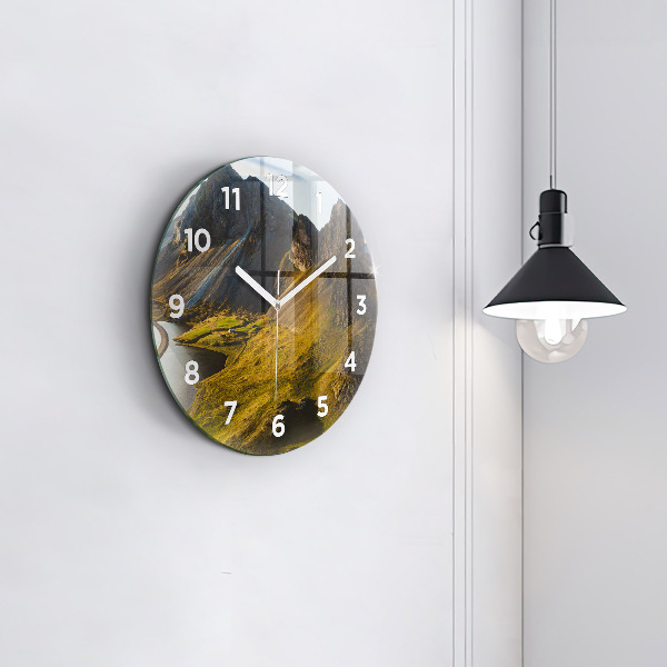 Round glass clock Road in Iceland