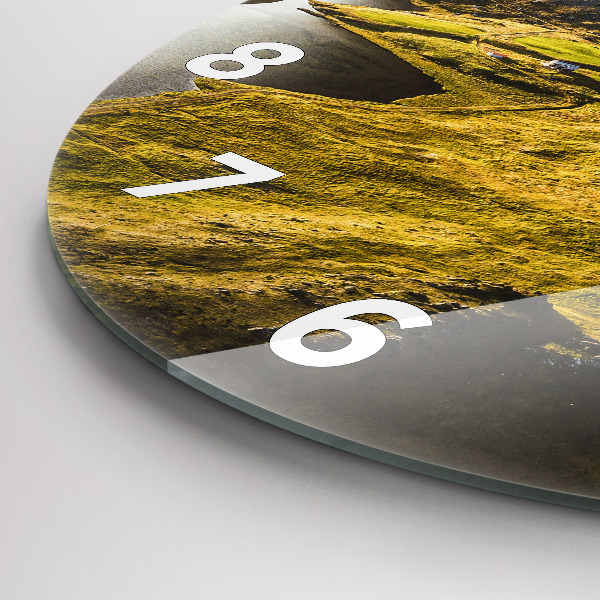 Round glass clock Road in Iceland