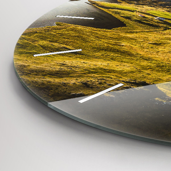 Round glass clock Road in Iceland