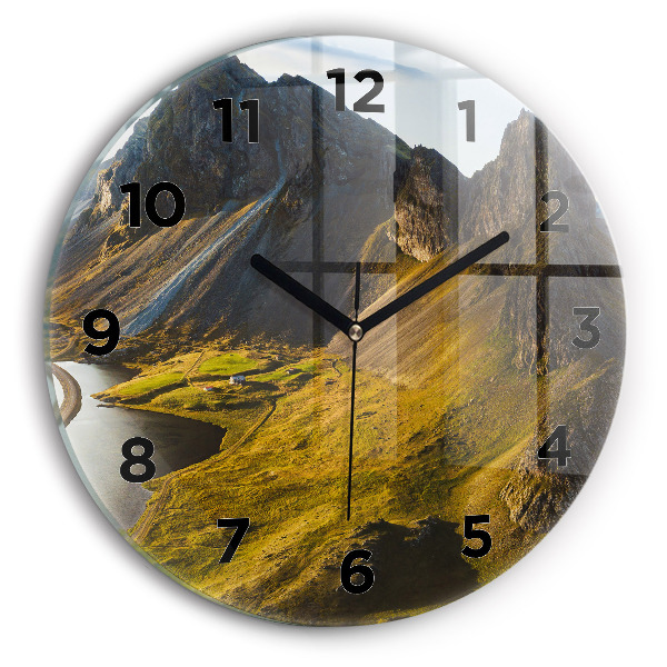 Round glass clock Road in Iceland