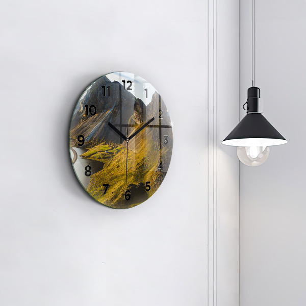 Round glass clock Road in Iceland