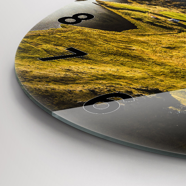 Round glass clock Road in Iceland