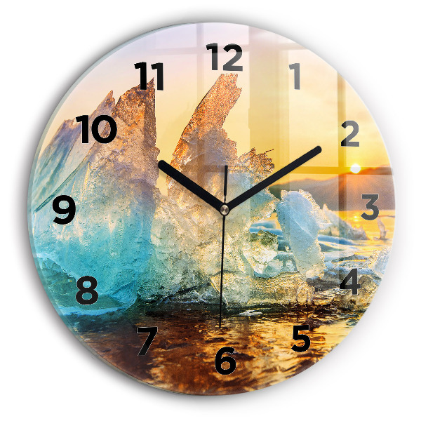Round glass clock Iceberg and sunrise