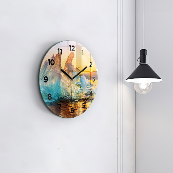 Round glass clock Iceberg and sunrise