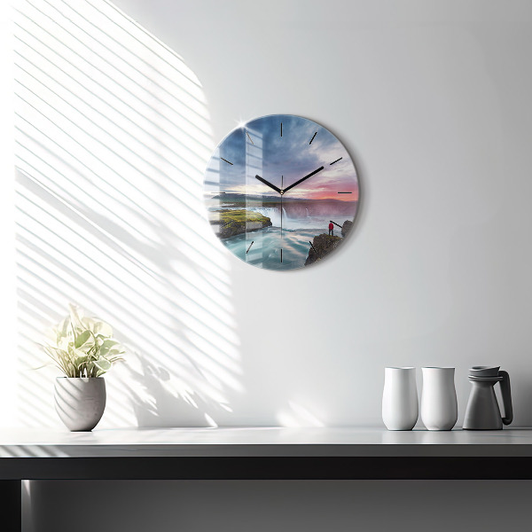 Round glass clock Landscape with a waterfall