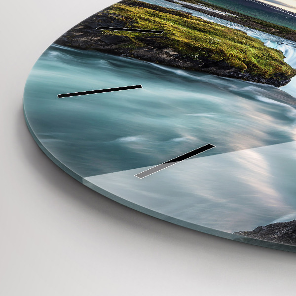 Round glass clock Landscape with a waterfall