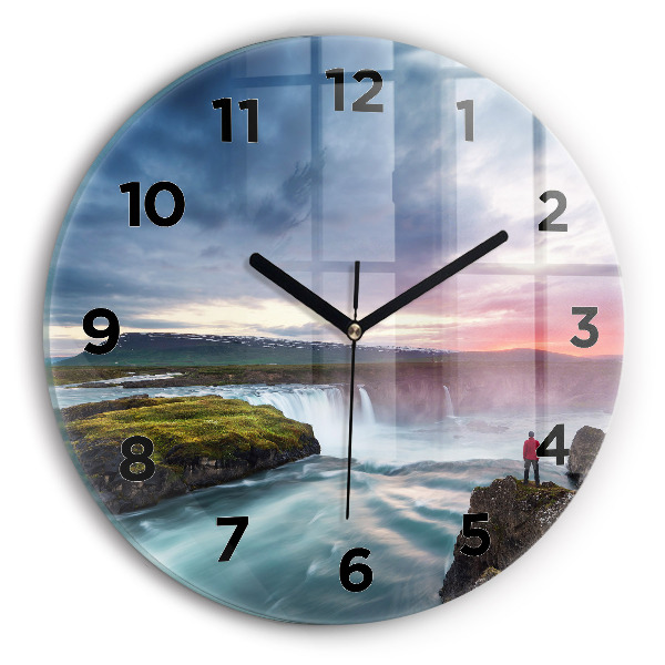Round glass clock Landscape with a waterfall