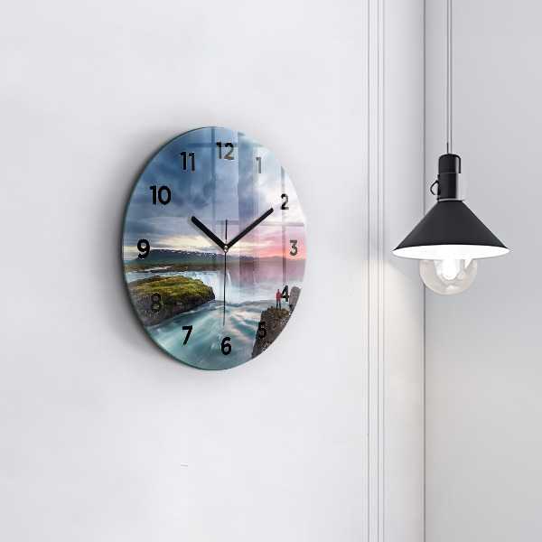 Round glass clock Landscape with a waterfall
