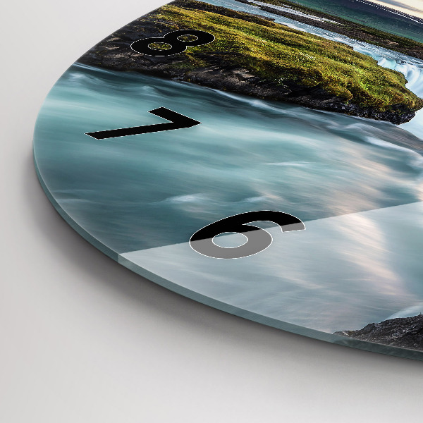 Round glass clock Landscape with a waterfall